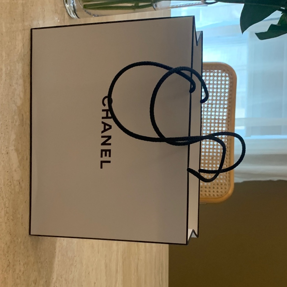 CHANEL White cosmetic bag